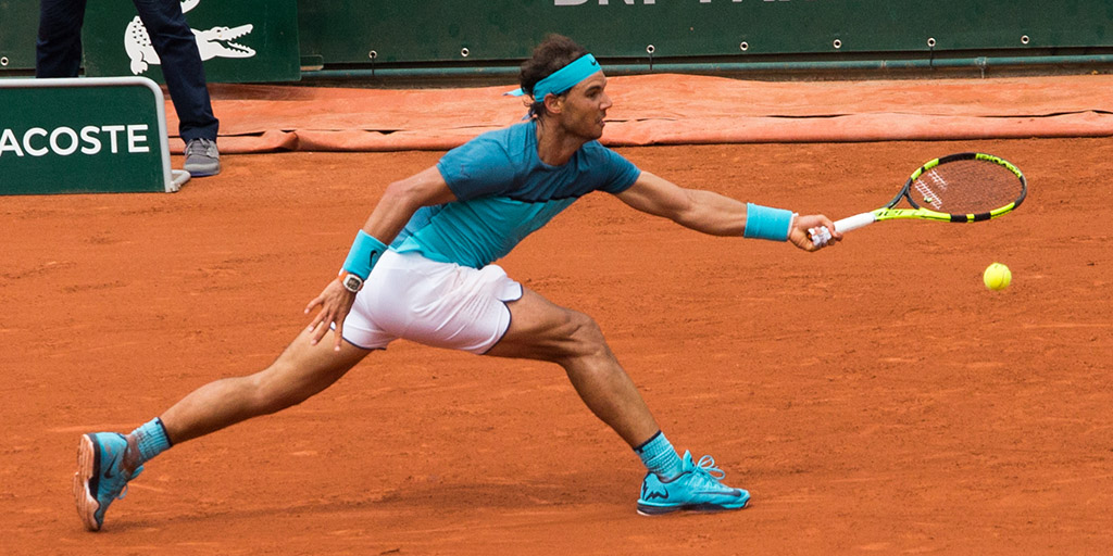 Rafael Nadal chasing a ball