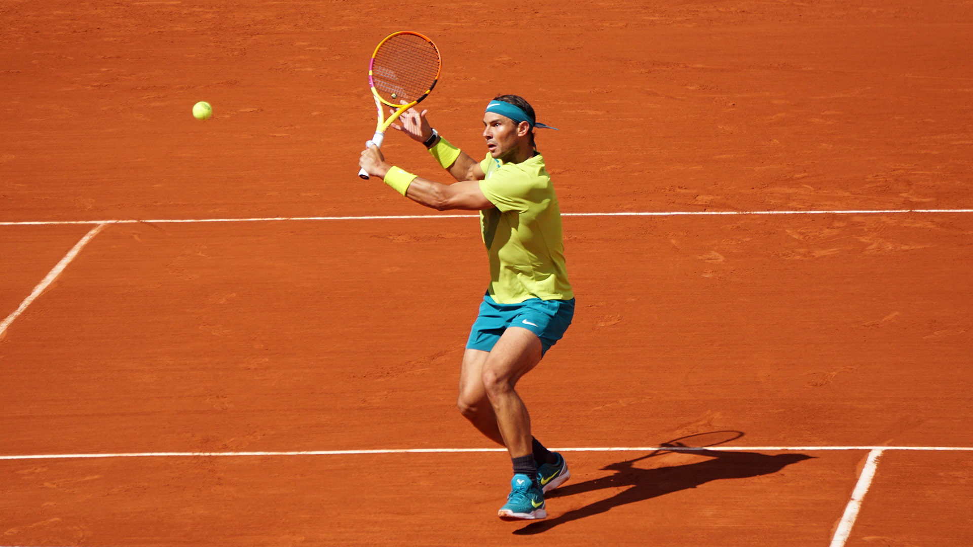 Rafael Nadal volleys at Roland Garros