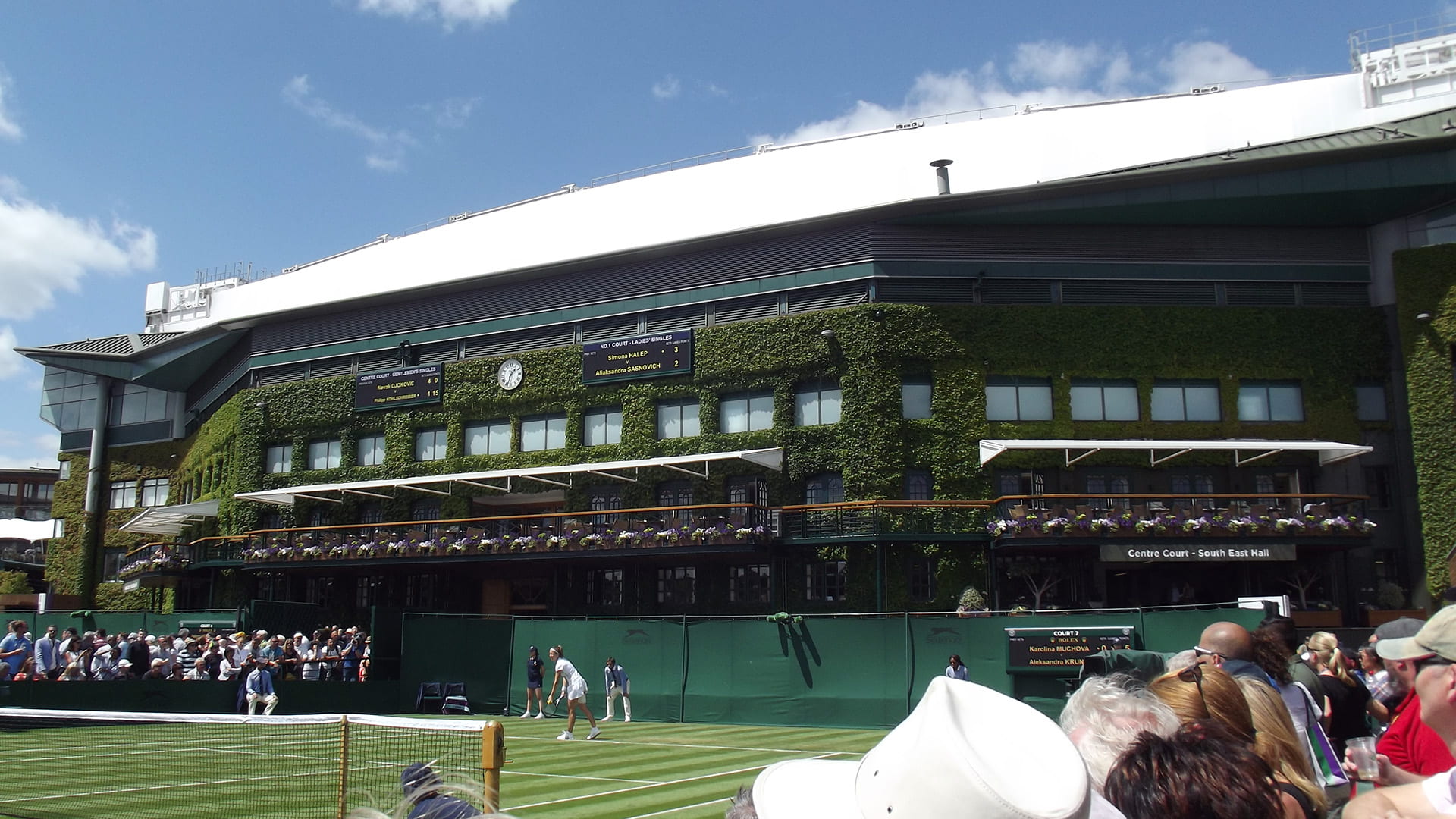 Wimbledon scene with Centre Court in background
