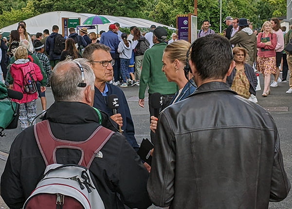 Mats Wilander and Barbara Schett broadcasting at Wimbledon