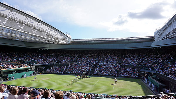 Centre Court with the roof open and Nadal playing