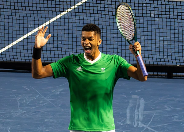 Michael Agwi celebrates during the match