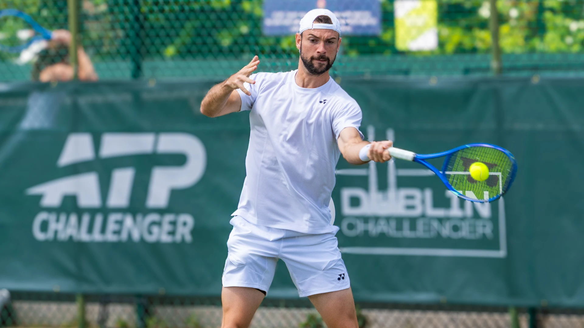 Jurij Rodionov strikes a forehand