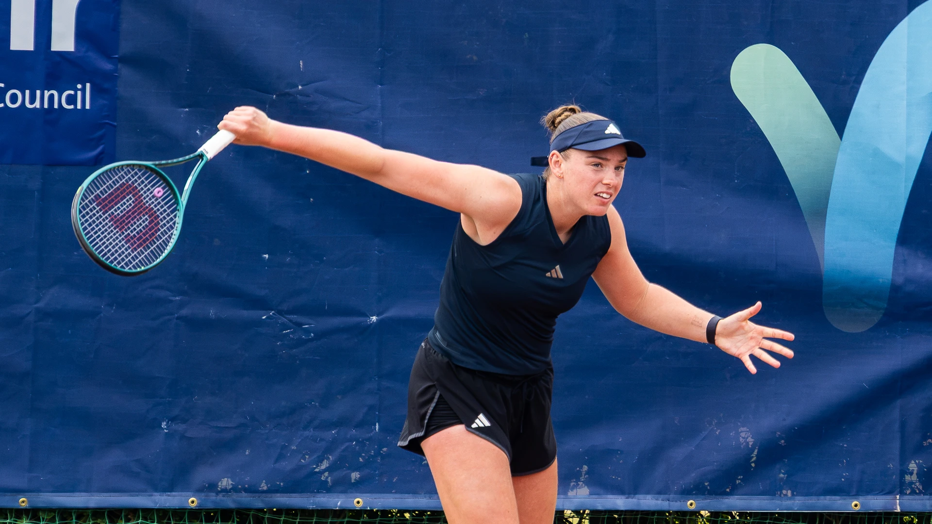 Amelia Rajecki slices the ball