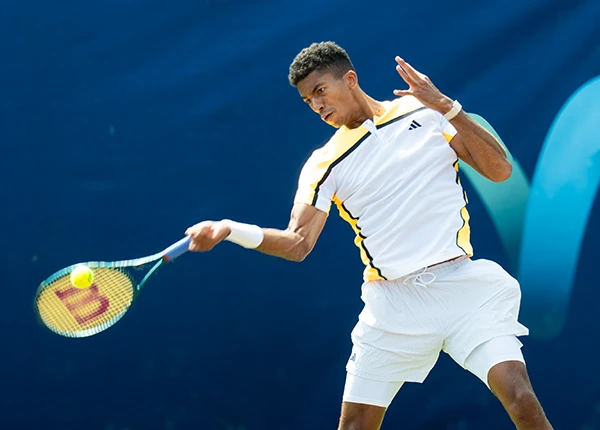 Michael Agwi strikes a forehand at the 2025 Irish Open