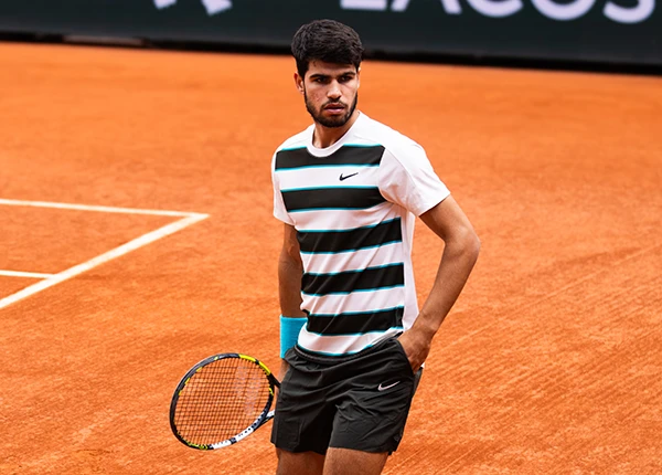 Carlos Alcaraz waiting for a ball at Roland Garros