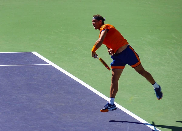 Rafael Nadal serves at Indian Wells