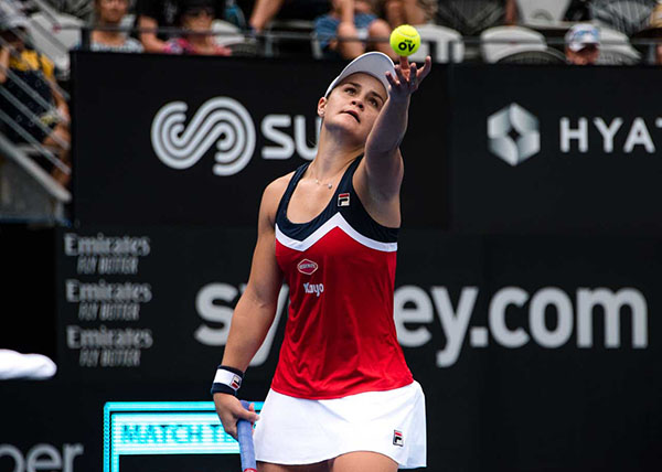 Ash Barty while serving