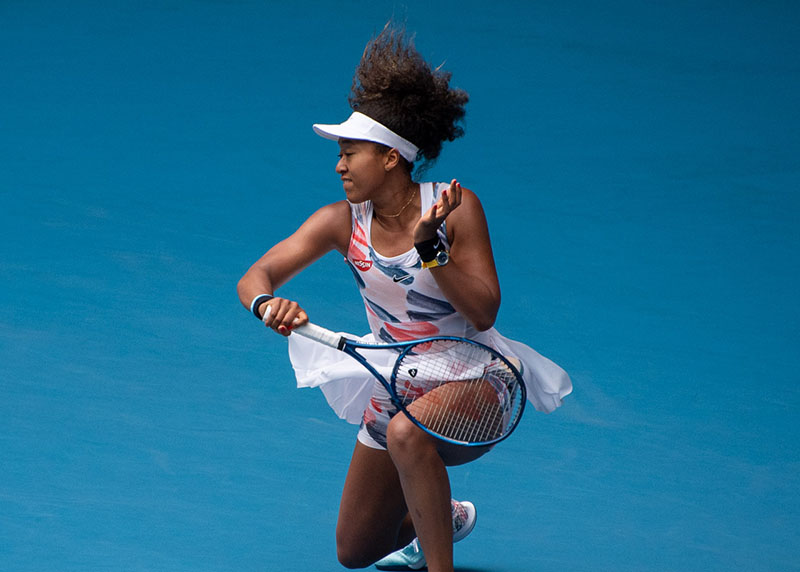 Naomi Osaka strikes a forehand